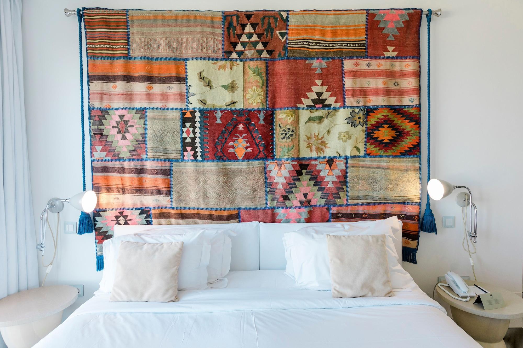 אובידוס Evolutee Hotel מראה חיצוני תמונה A bed with a headboard